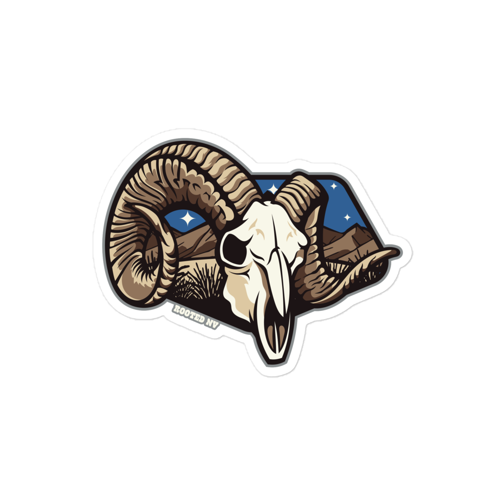 Nevada Desert Bighorn Durable Weather Resistant Decal with a bold bighorn sheep skull illustration, desert mountain scenery, and starry Nevada sky; Nevada Desert Bighorn Decal for trucks, laptops, and water bottles
